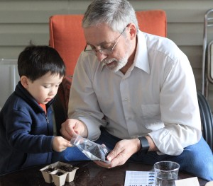 February 2016 Our Little Roots - Little G and Papa with soil