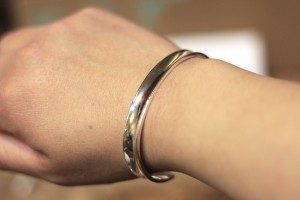 Bangle bracelet without hair tie