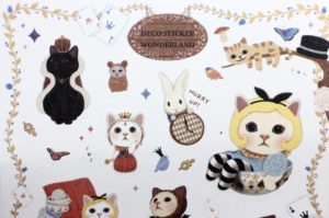 Close up of Alice in Wonderland cat stickers