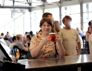 Joanne enjoying her pint at New Belgium